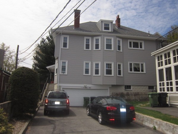8-10 Kimball Road Watertown, MA 02472 - Photo 2 of 20 a car parked in front of a building