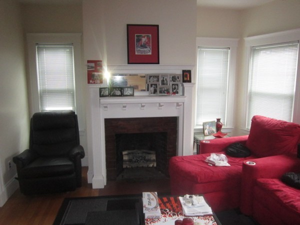 8-10 Kimball Road Watertown, MA 02472 - Photo 4 of 20 a living room with furniture and a fireplace