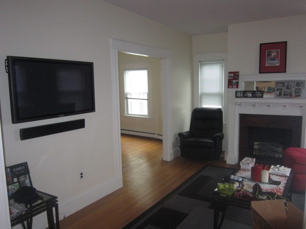 8-10 Kimball Road Watertown, MA 02472 - Photo 6 of 20 a living room with furniture and a flat screen tv