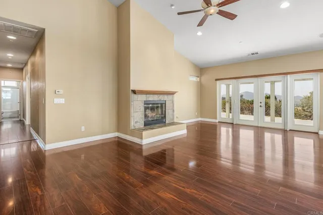 a kitchen with stainless steel appliances a refrigerator and a stove