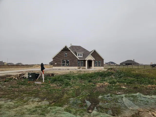 a house view with a garden space