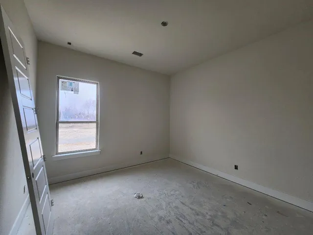 a view of a window in an empty room