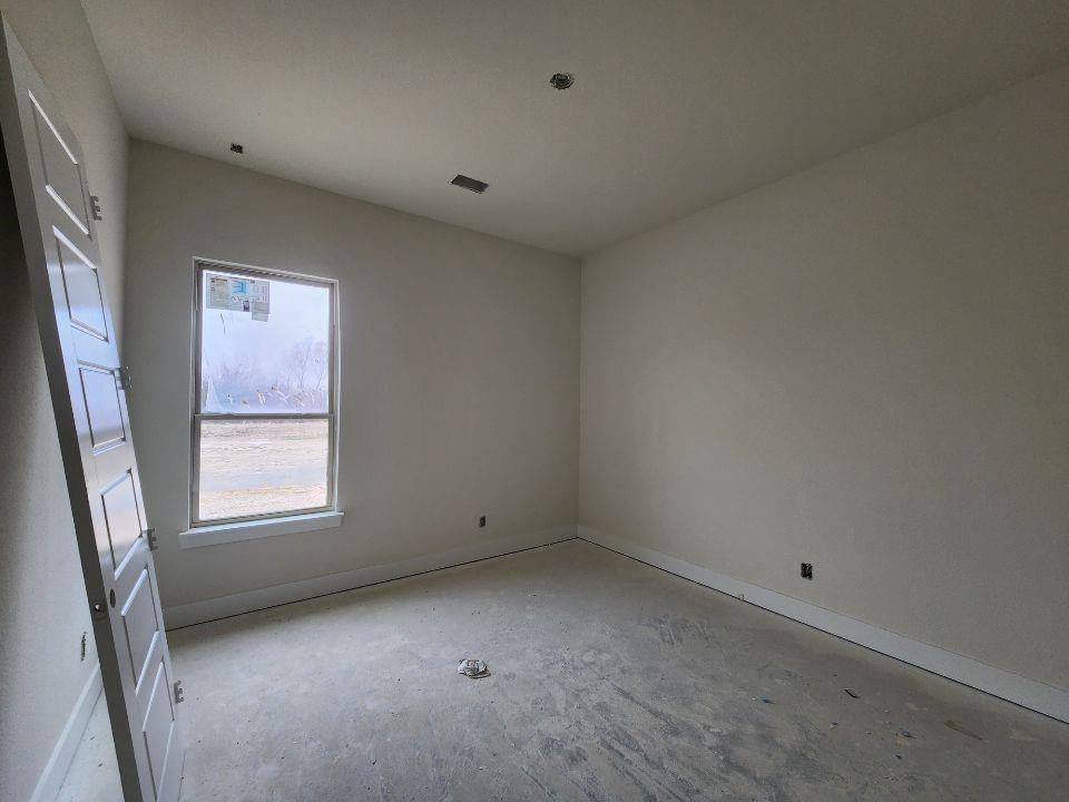 2433 Meteor Drive Krum, TX 76249 - Photo 11 of 12 a view of a window in an empty room