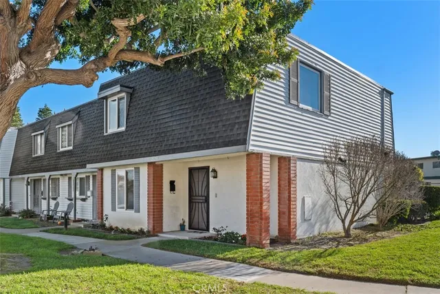 front view of house with a yard