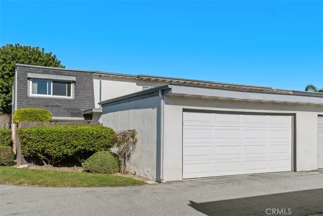 a view of a house with a garage