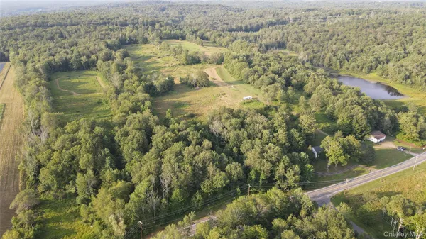a view of residential houses with lake view