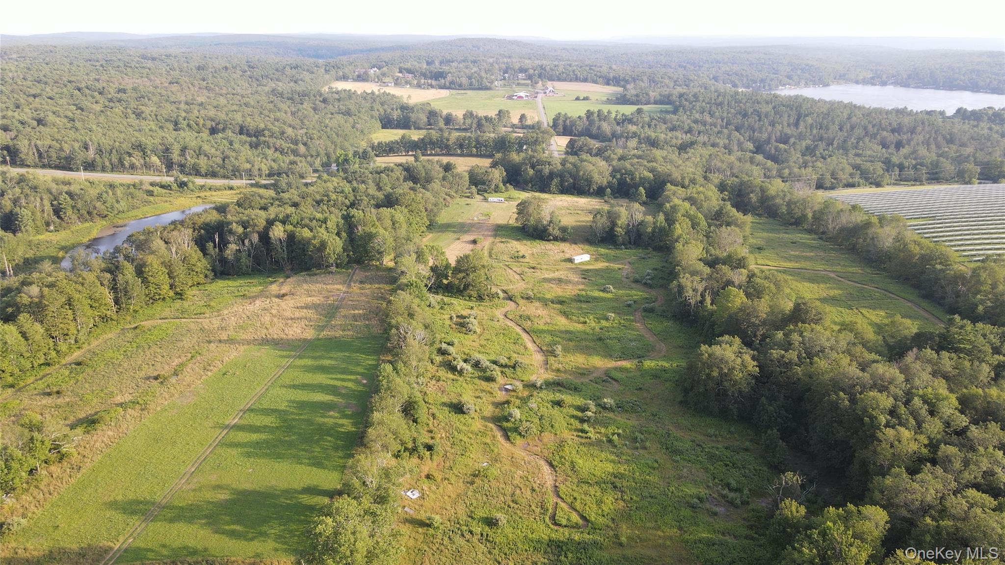 150 Sackett Lake Road Monticello, NY 12701 - Photo 6 of 10 a view of a lake view