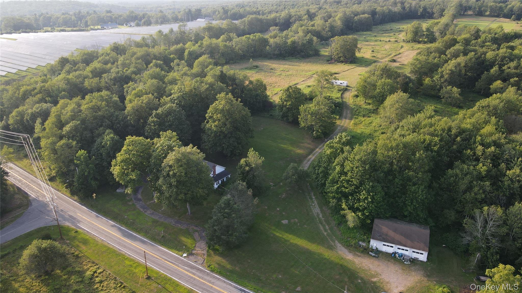150 Sackett Lake Road Monticello, NY 12701 - Photo 9 of 10 a view of swimming pool from a balcony