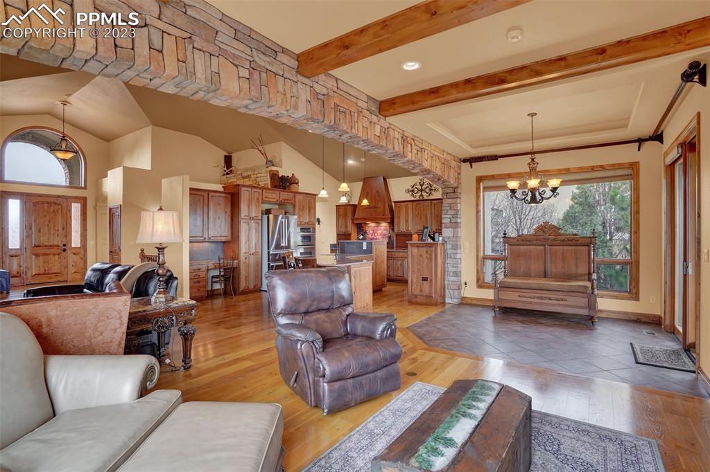 4655 Seton Hall Road Colorado Springs, CO 80918 - Photo 12 of 50 a living room with furniture and a large window