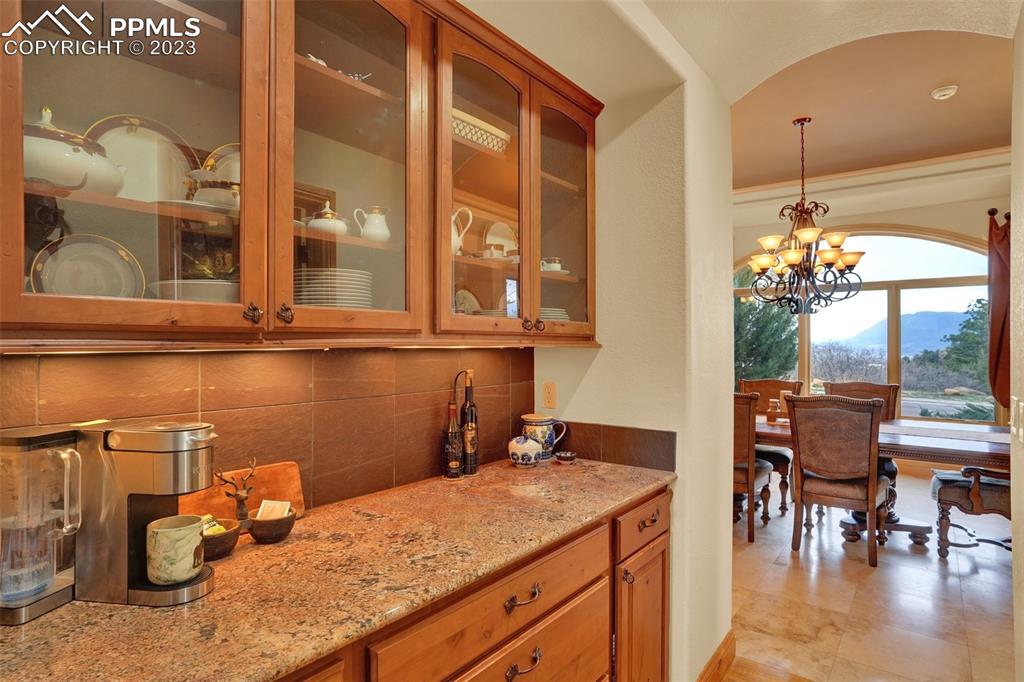 4655 Seton Hall Road Colorado Springs, CO 80918 - Photo 15 of 50 a kitchen with a sink and a refrigerator