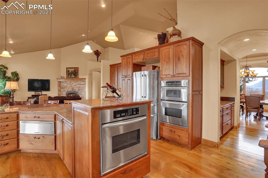 4655 Seton Hall Road Colorado Springs, CO 80918 - Photo 19 of 50 a kitchen with a stove and a refrigerator