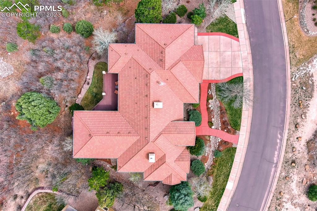 4655 Seton Hall Road Colorado Springs, CO 80918 - Photo 50 of 50 an aerial view of a house with yard and parking