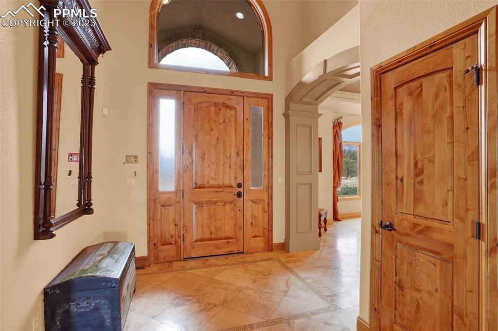 4655 Seton Hall Road Colorado Springs, CO 80918 - Photo 6 of 50 wooden floor and windows in a room