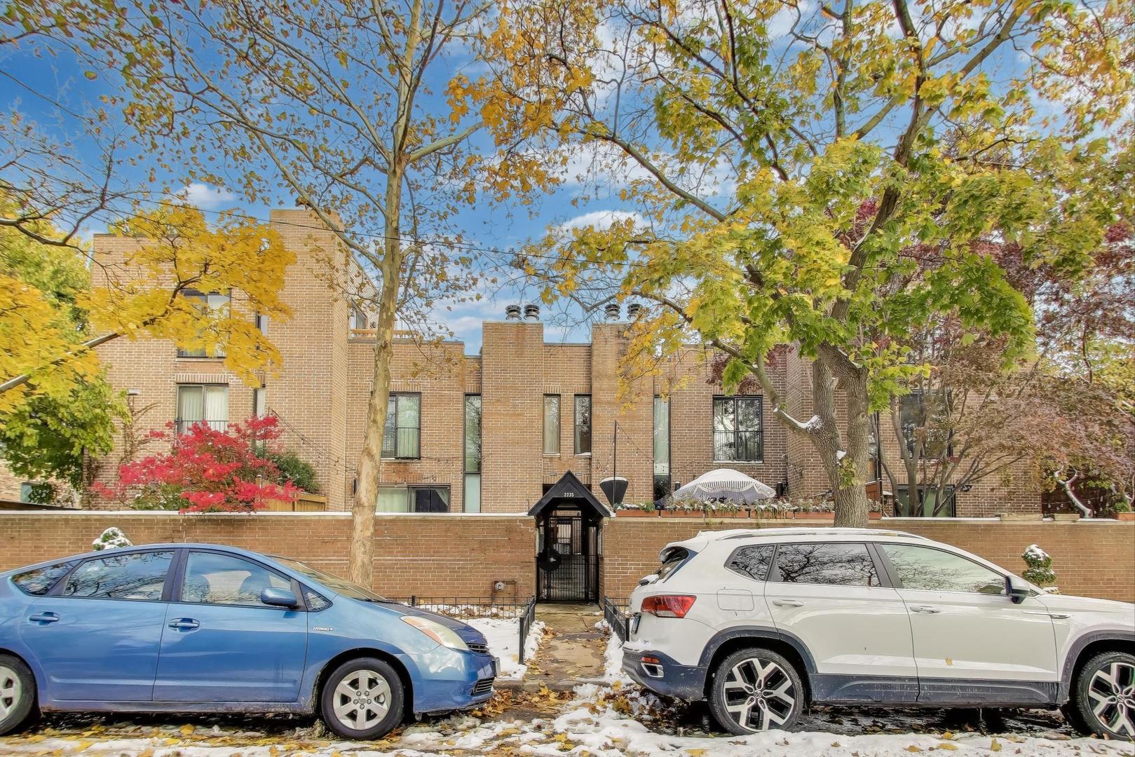 a front view of a house with parking area