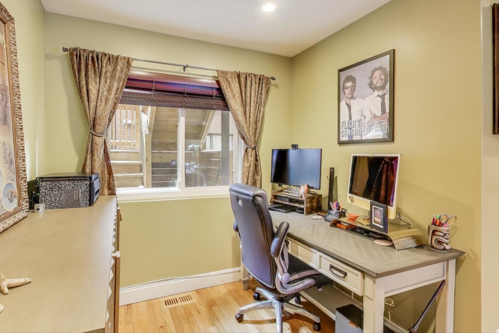 2235 North Lakewood Avenue, Unit FN Chicago, IL 60614 - Photo 11 of 41 a view of a workspace with furniture and a window