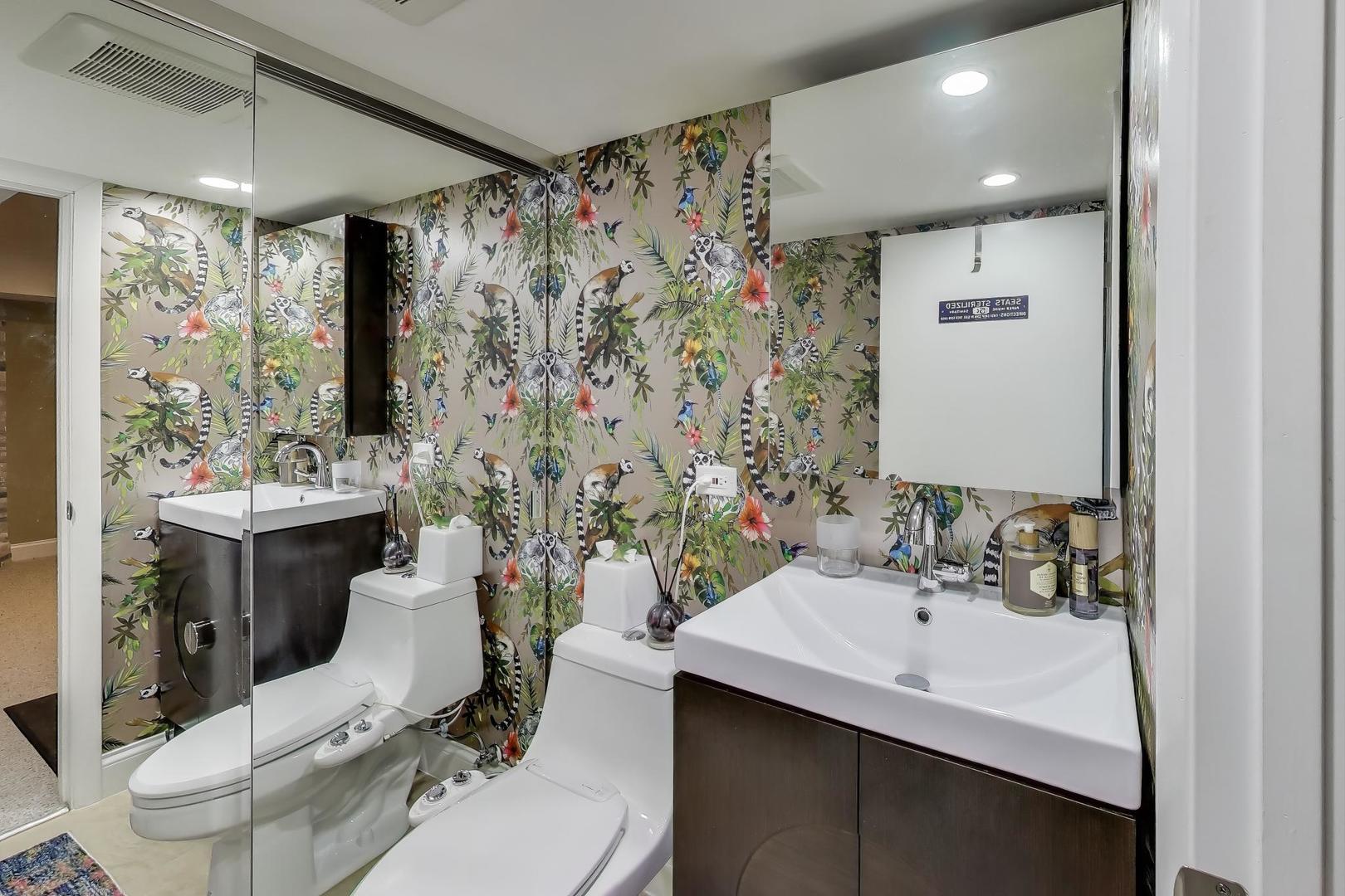 2235 North Lakewood Avenue, Unit FN Chicago, IL 60614 - Photo 35 of 41 a bathroom with a sink toilet tub and shower