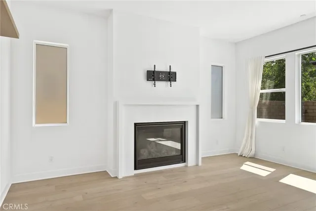 a living room with a fireplace