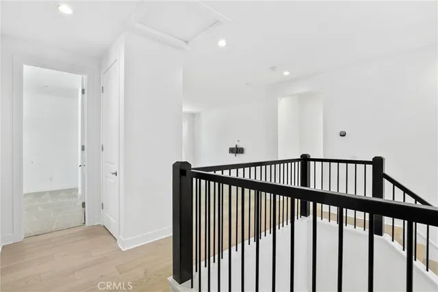 a view of staircase with rug floor