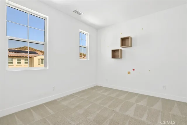 a bathroom with a sink vanity and a mirror