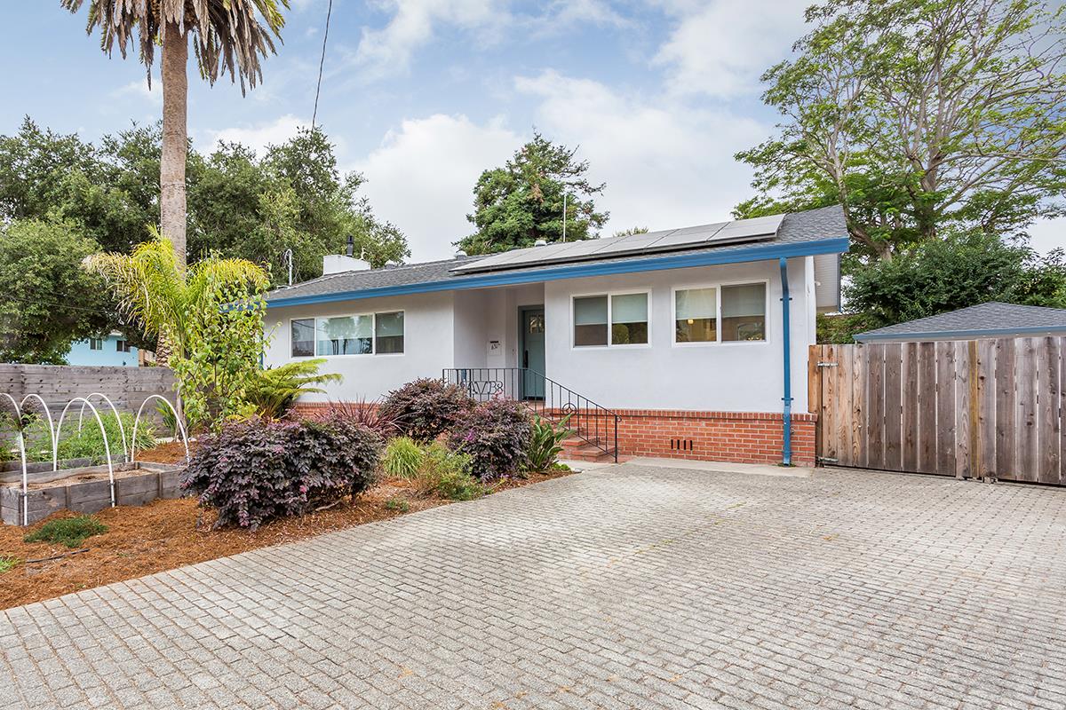 631 Riverside Avenue Santa Cruz, CA 95060 - Photo 1 of 25 a front view of a house with a garden