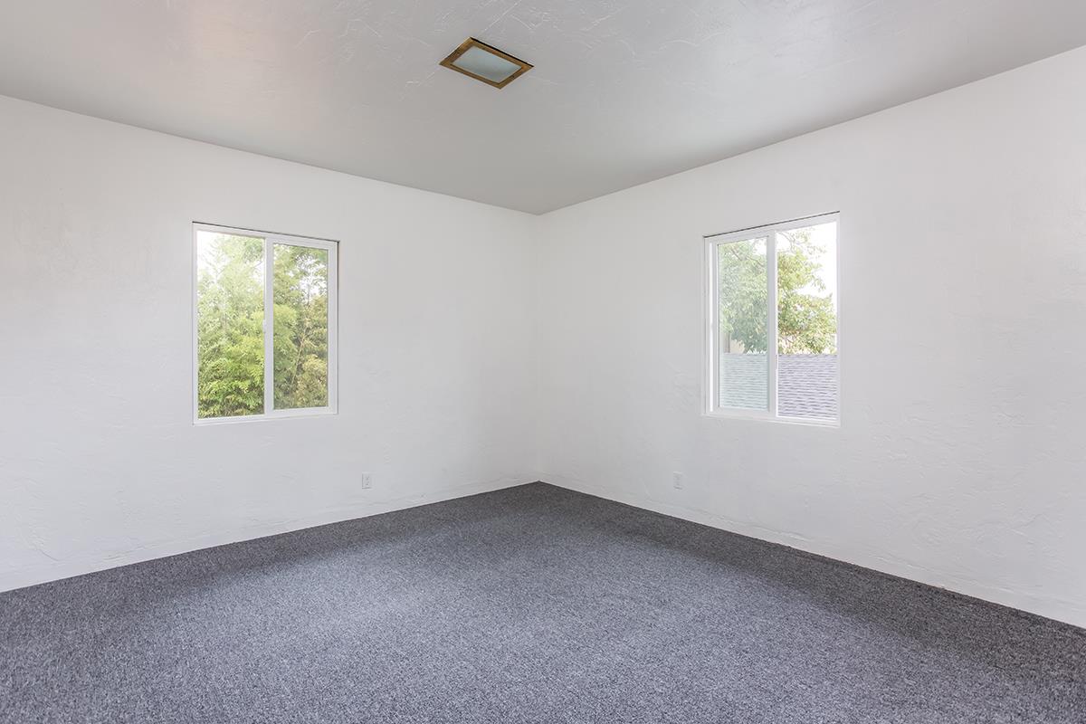 631 Riverside Avenue Santa Cruz, CA 95060 - Photo 11 of 25 an empty room with windows