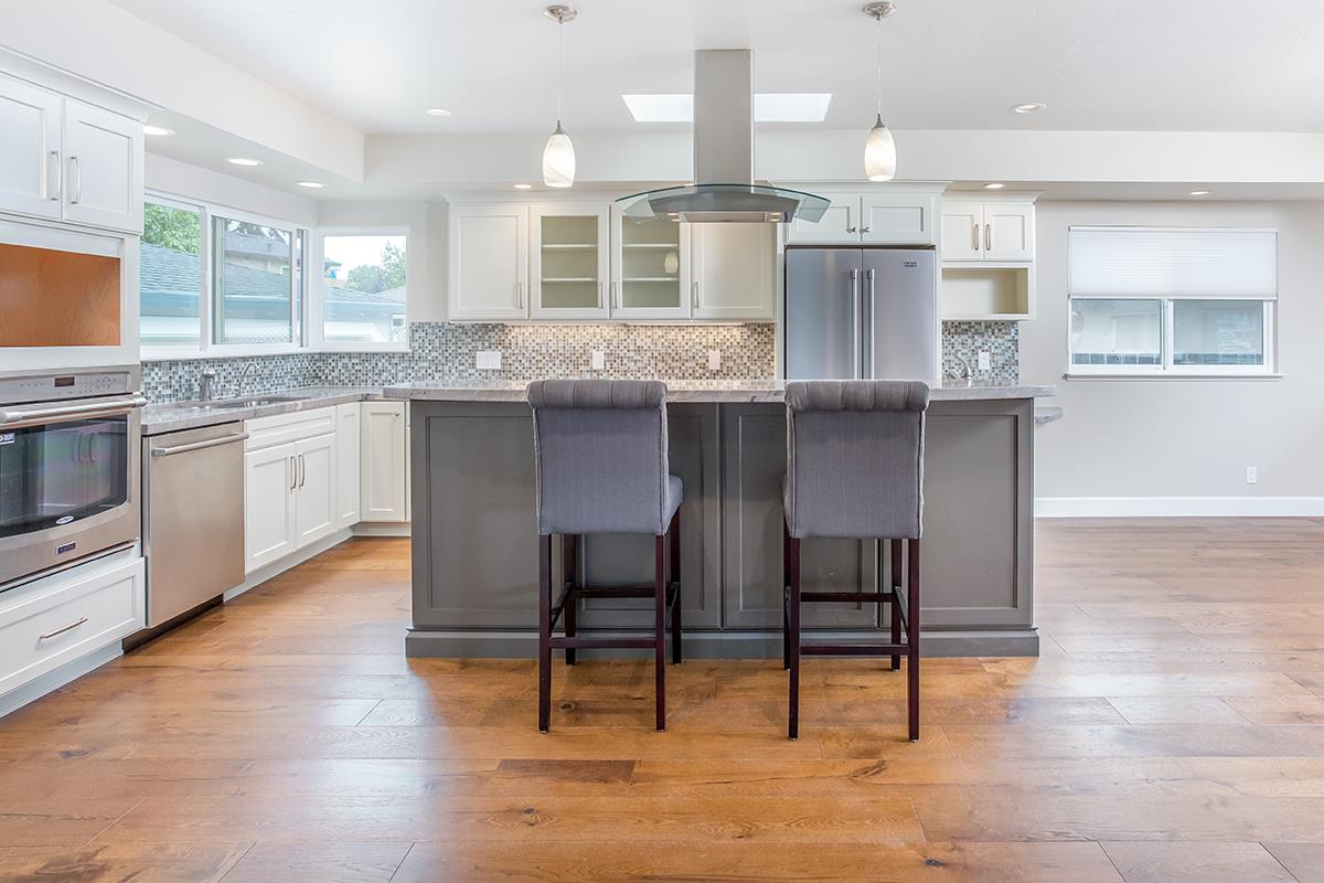 631 Riverside Avenue Santa Cruz, CA 95060 - Photo 2 of 25 a kitchen with cabinets and chairs