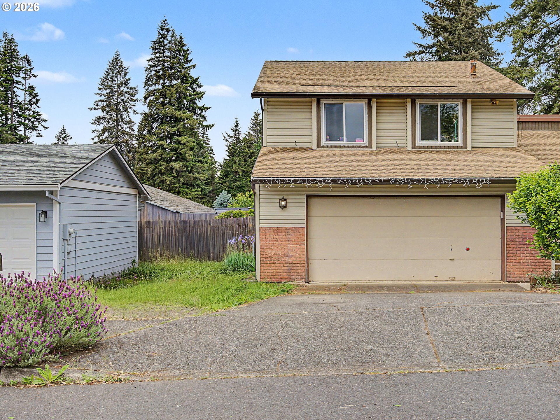 18015 Davis Street Sandy, OR 97055 - Photo 37 of 40 a front view of a house with a yard and garage