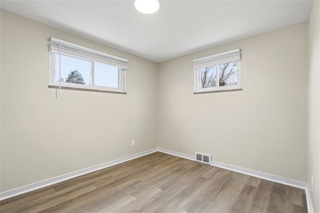 2446 Willowbrook Road Pittsburgh, PA 15241 - Photo 20 of 31 an empty room with a painting on the wall