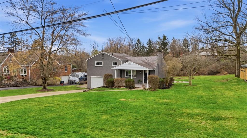 2446 Willowbrook Road Pittsburgh, PA 15241 - Photo 2 of 31 a view of a house with a big yard and large trees