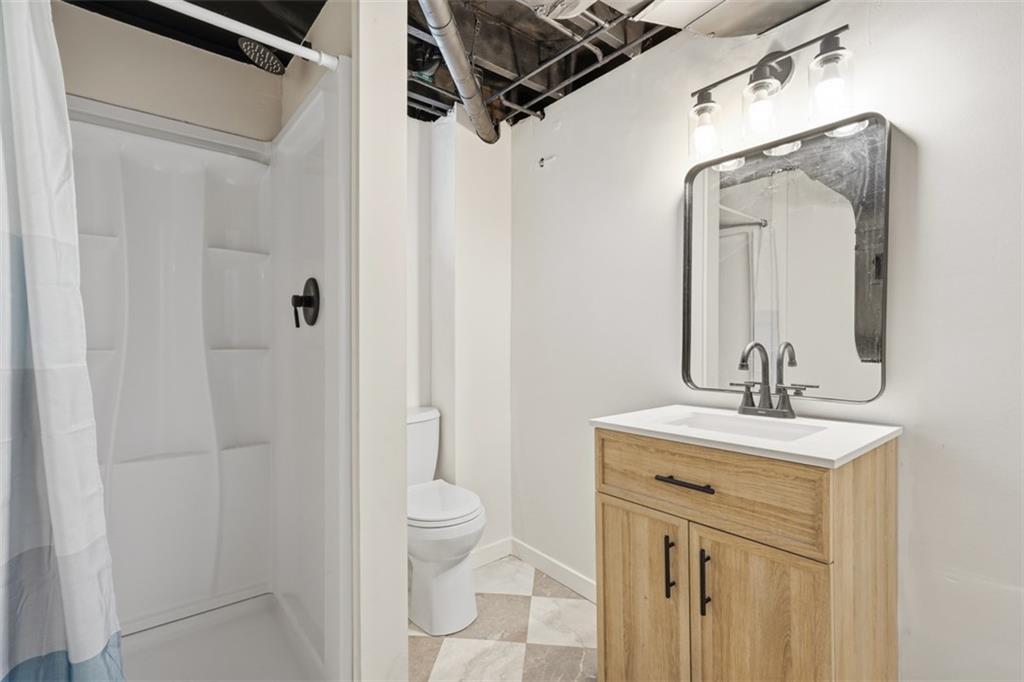 2446 Willowbrook Road Pittsburgh, PA 15241 - Photo 24 of 31 a bathroom with a toilet sink and shower