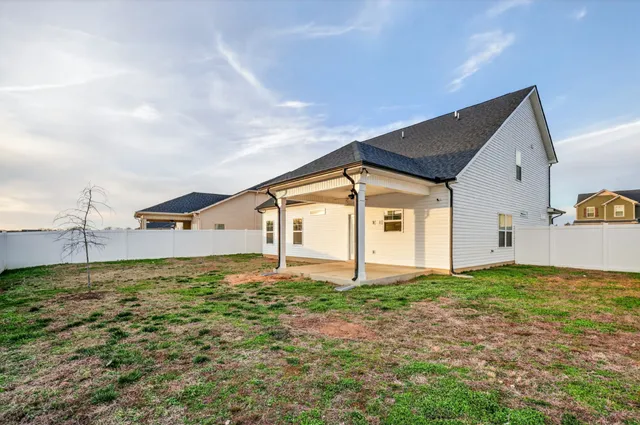 a house view with a backyard space