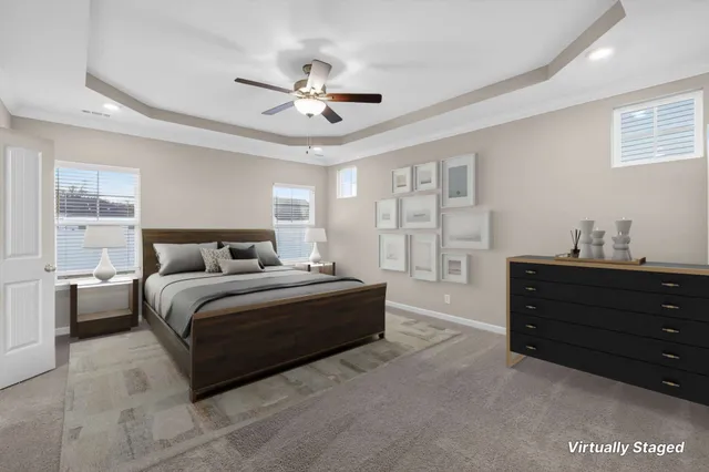 a bedroom with bed and window