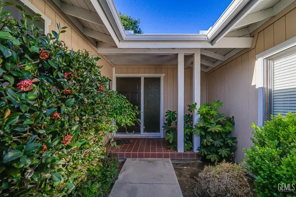 a view of house with outdoor space