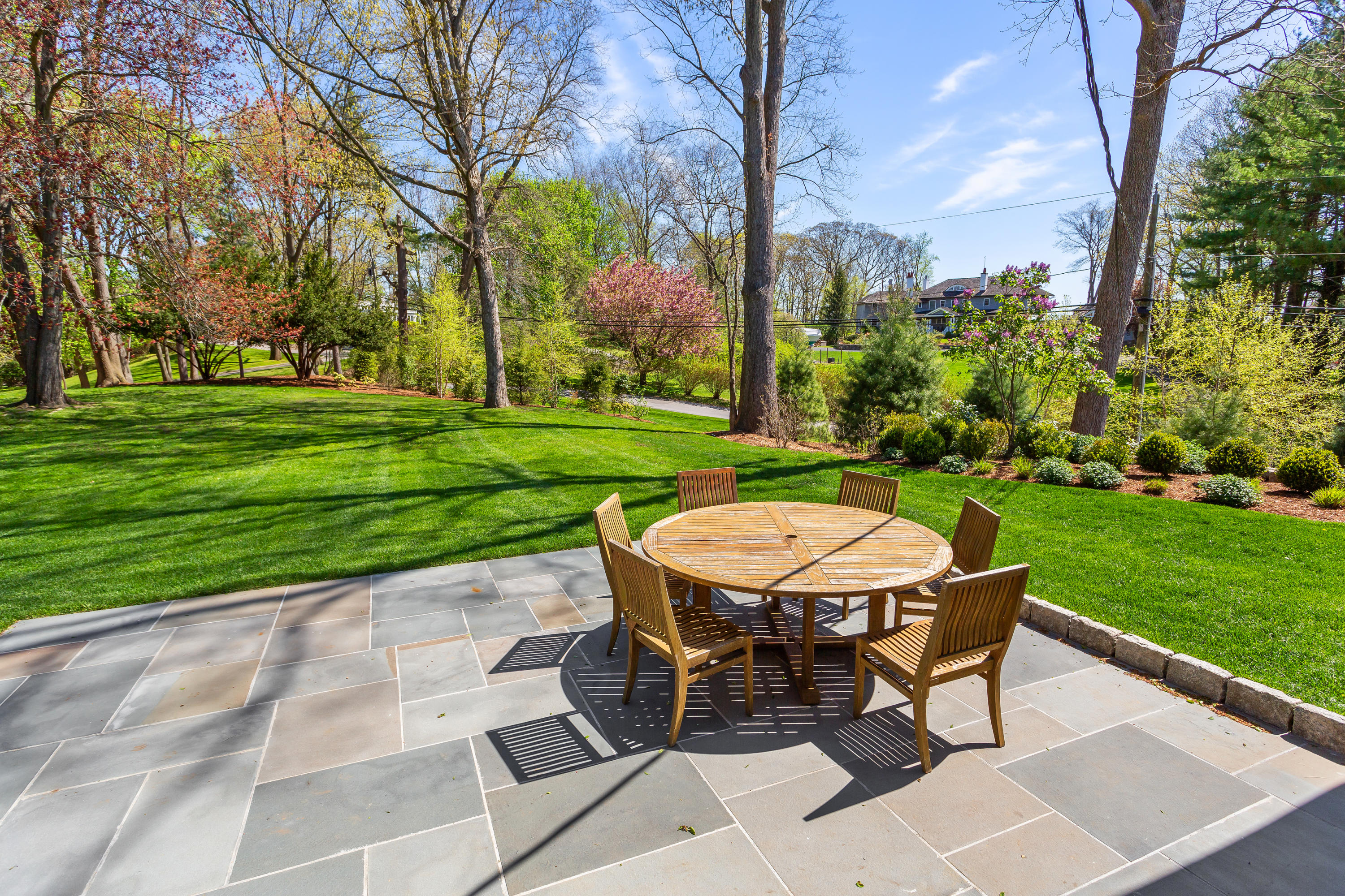 33 Point Road Norwalk, CT 06854 - Photo 24 of 29 a view of a backyard with table and chairs and potted plants