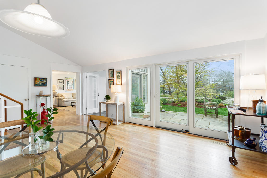 33 Point Road Norwalk, CT 06854 - Photo 5 of 29 a living room with furniture and a floor to ceiling window