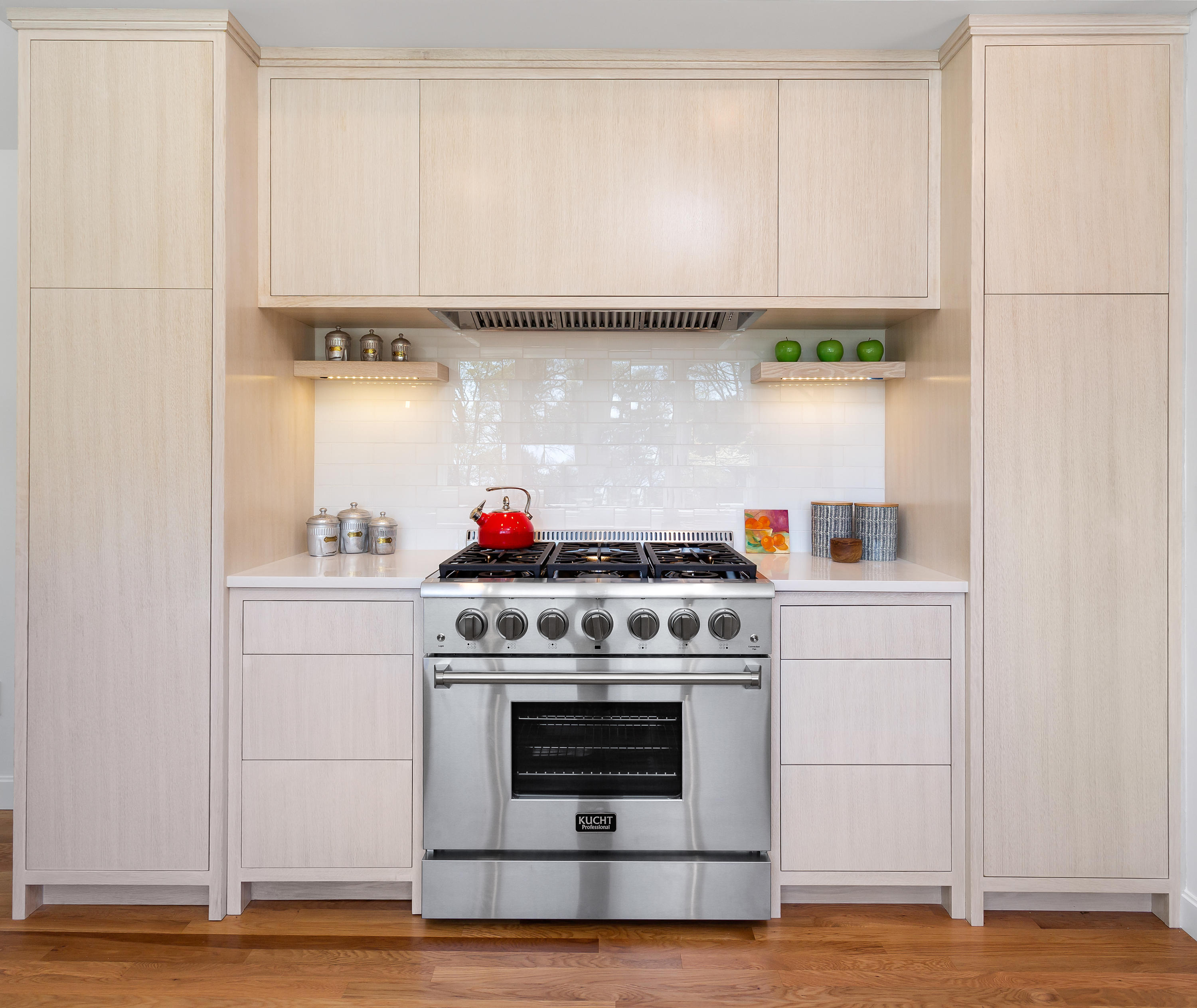 33 Point Road Norwalk, CT 06854 - Photo 9 of 29 a stove top oven sitting inside of a kitchen
