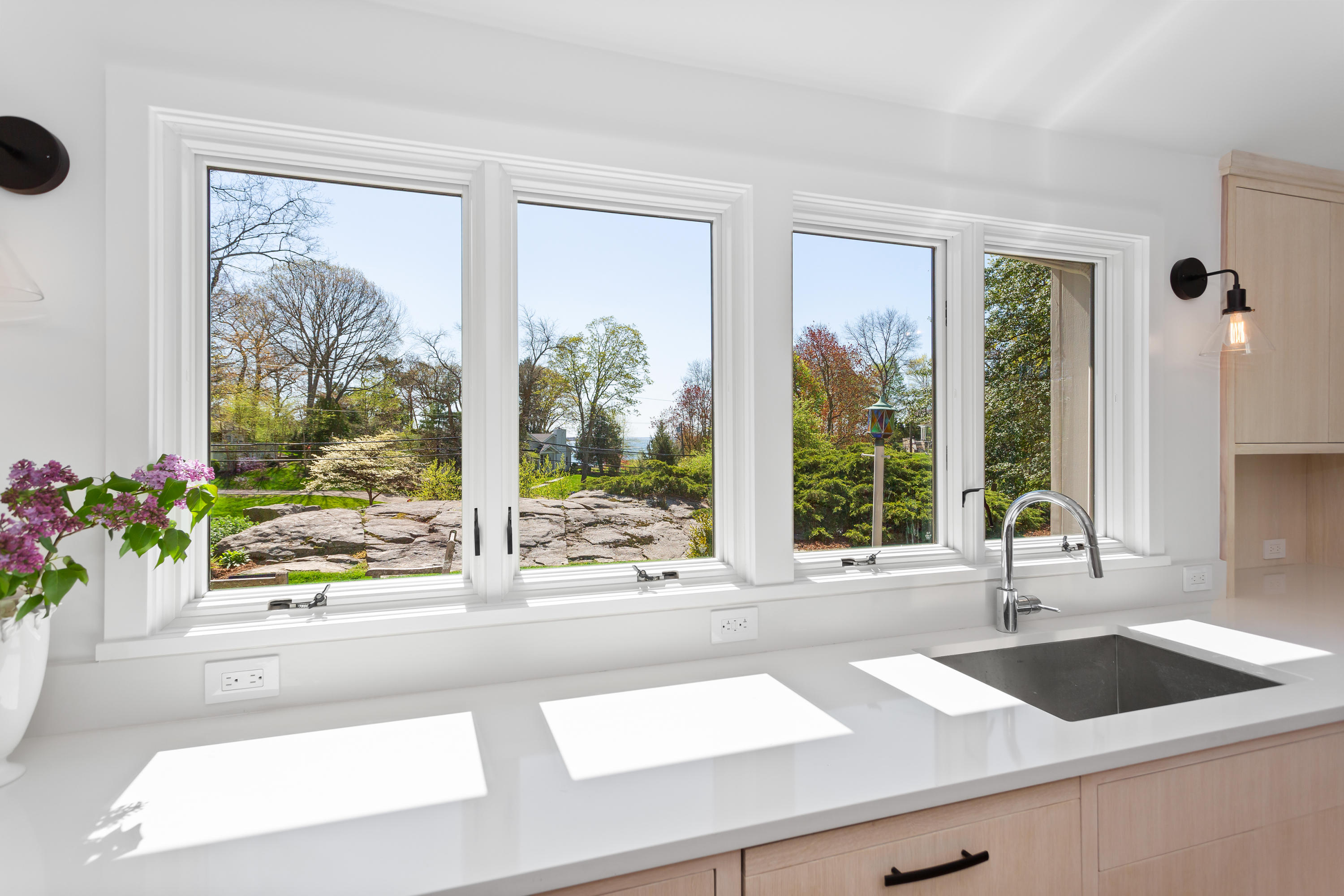 33 Point Road Norwalk, CT 06854 - Photo 10 of 29 a view of a sink and a faucet a window