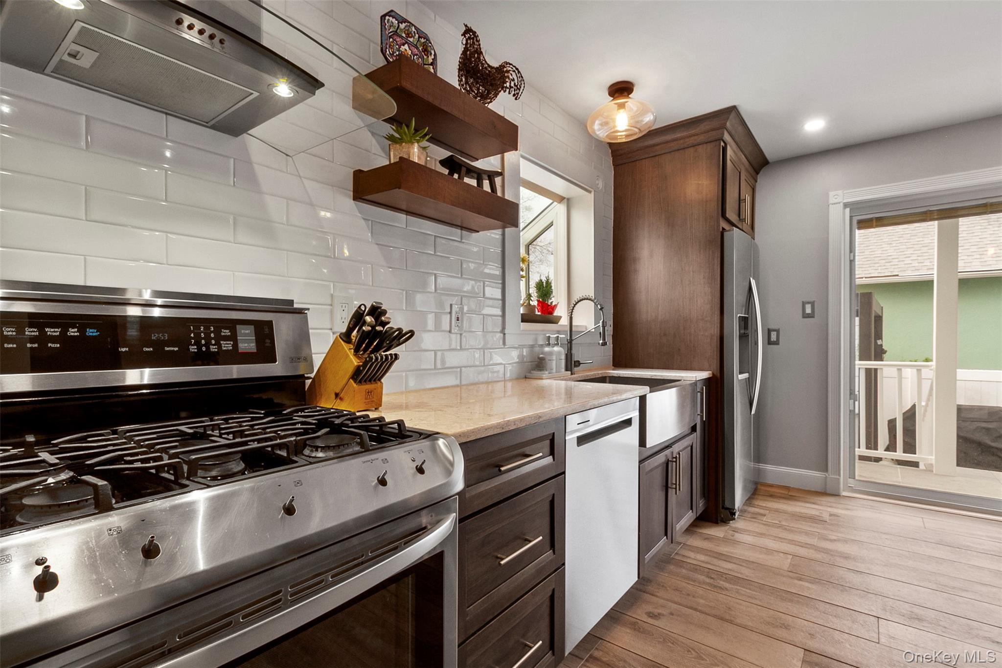 189 Rombout Avenue Beacon, NY 12508 - Photo 12 of 35 a kitchen with stove and cabinets