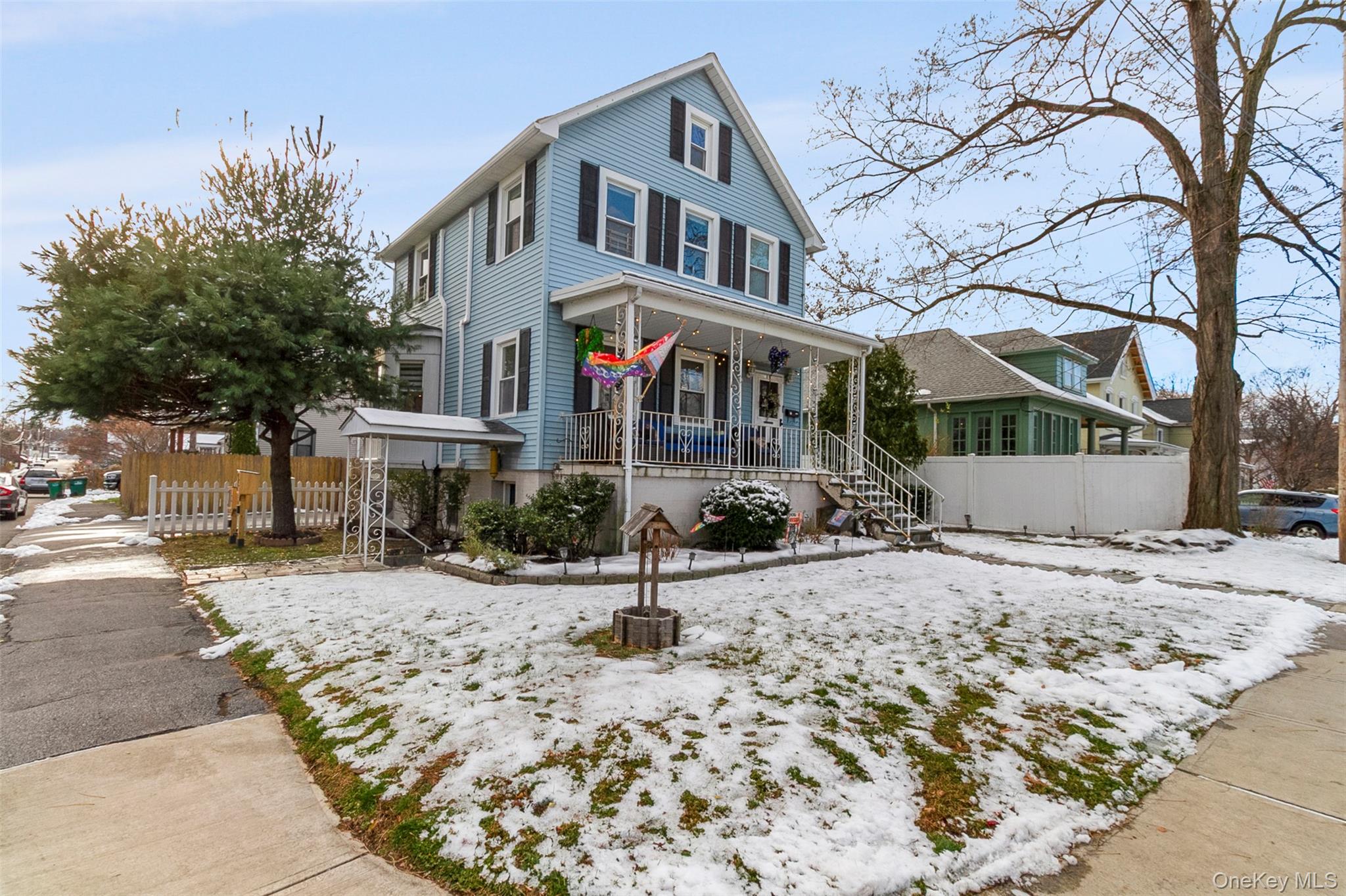 189 Rombout Avenue Beacon, NY 12508 - Photo 2 of 35 a front view of a house with a snow on the road