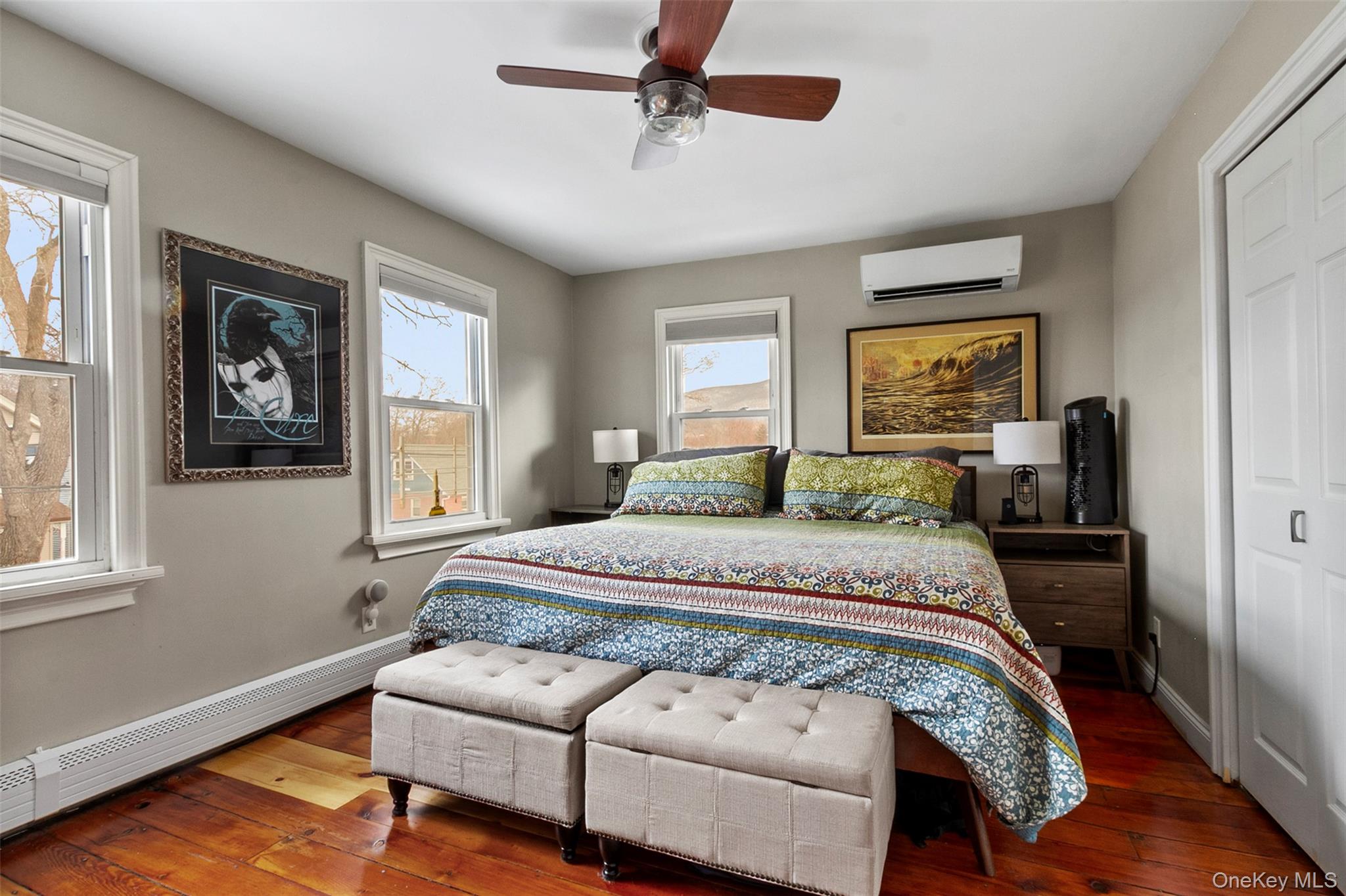 189 Rombout Avenue Beacon, NY 12508 - Photo 22 of 35 a bedroom with a bed and wooden floor