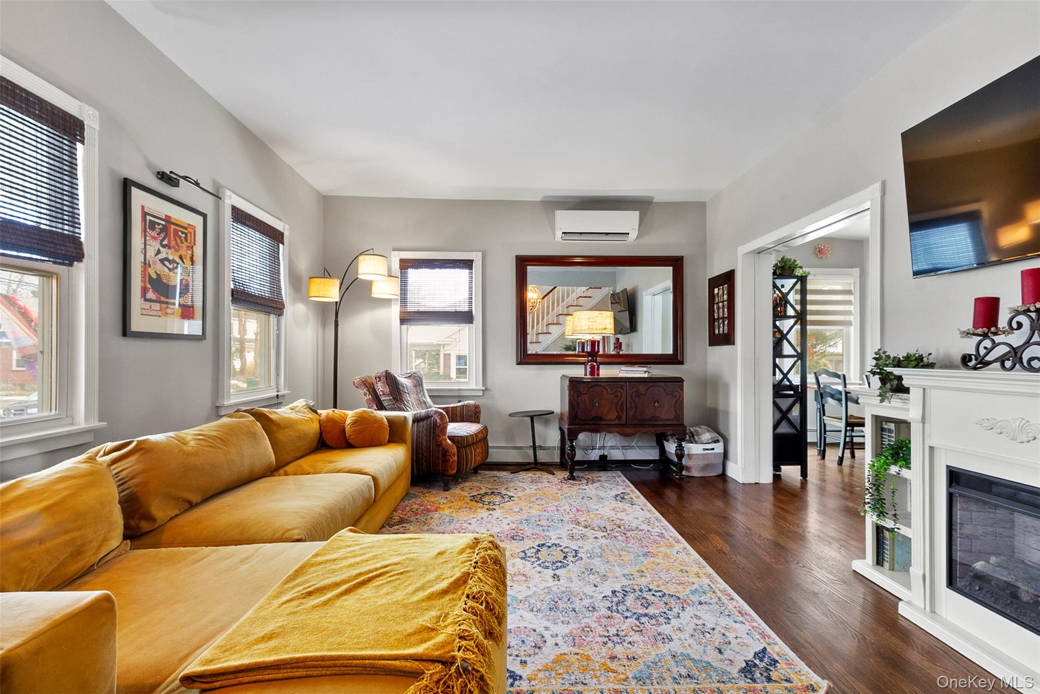 189 Rombout Avenue Beacon, NY 12508 - Photo 6 of 35 a living room with furniture and a flat screen tv