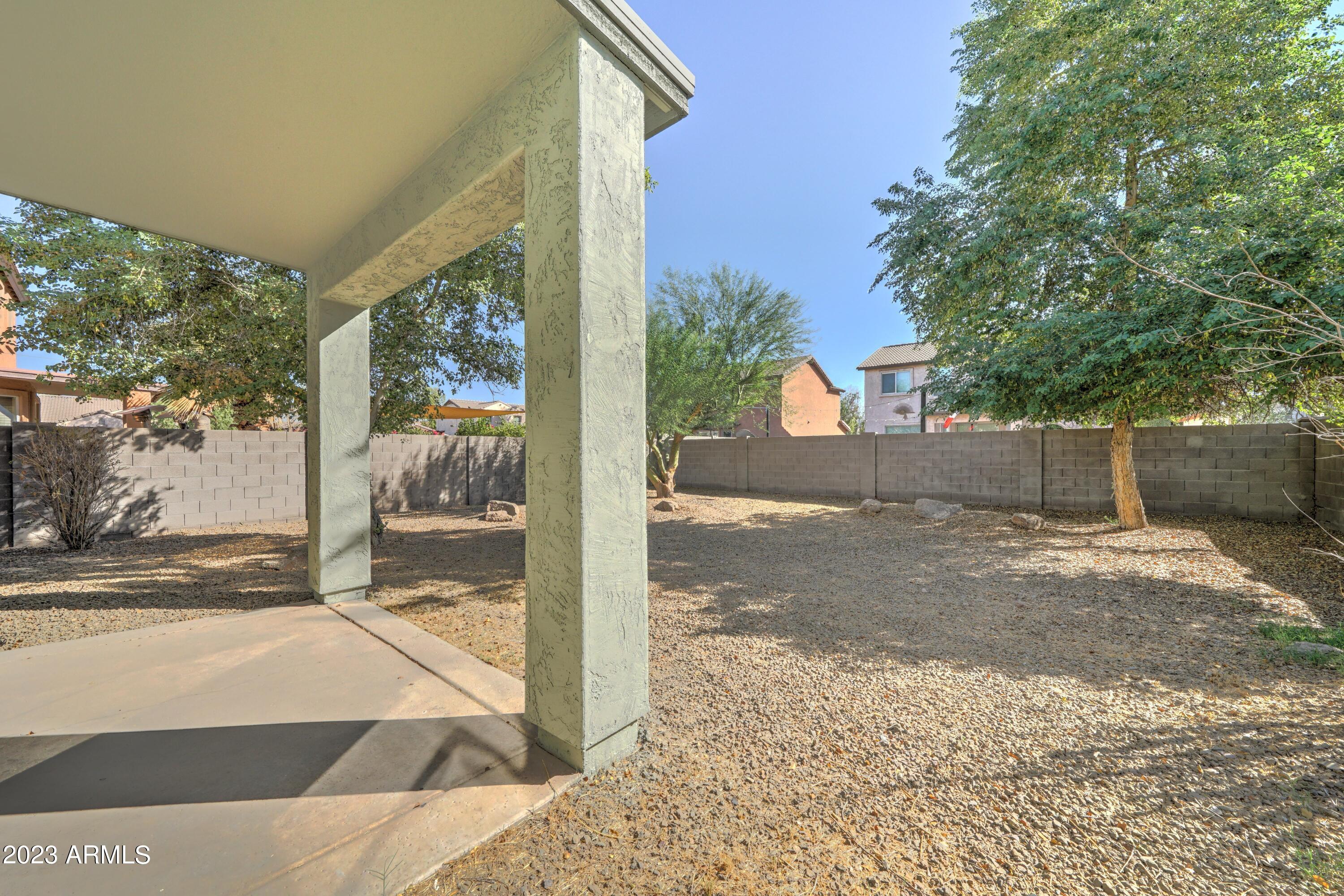 3813 West Shumway Farm Road Phoenix, AZ 85041 - Photo 30 of 31 3813 Backyard with mature trees