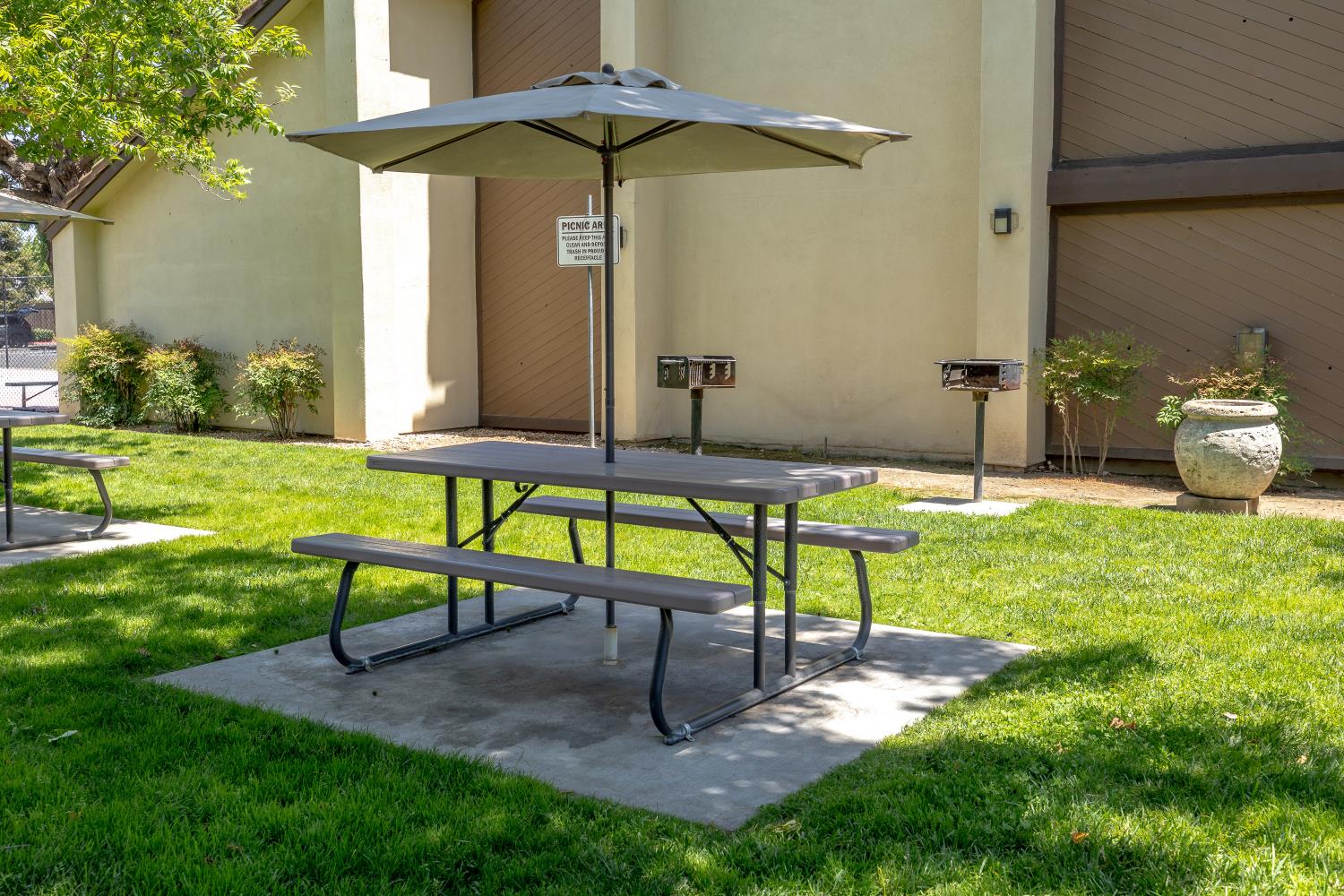 3700 Tully Road, Unit 5 Modesto, CA 95356 - Photo 35 of 38 a view of a bench in a patio