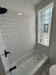 a bathroom with a bathtub