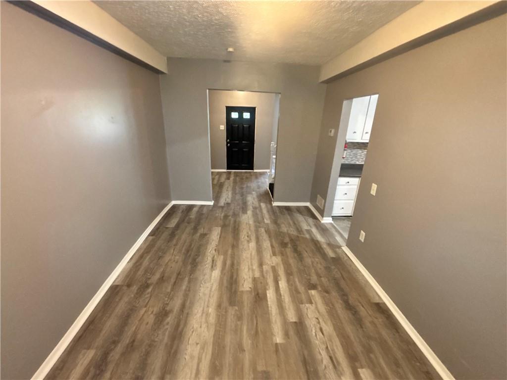 335 Cedarhurst Street Pittsburgh, PA 15210 - Photo 12 of 28 a view of wooden floor in a room
