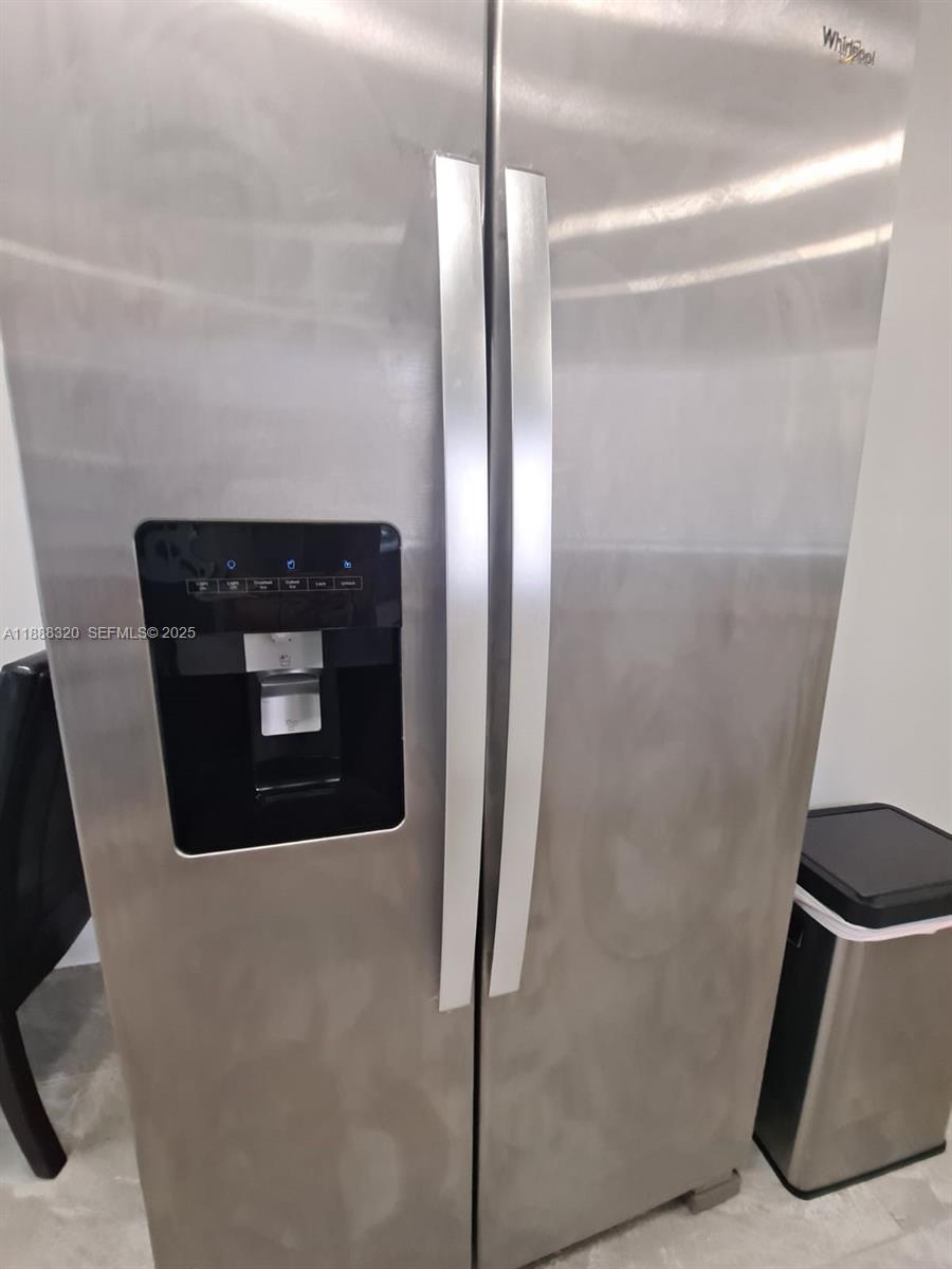 2242 Polk Street, Unit 1 Hollywood, FL 33020 - Photo 23 of 31 a close view of water heater