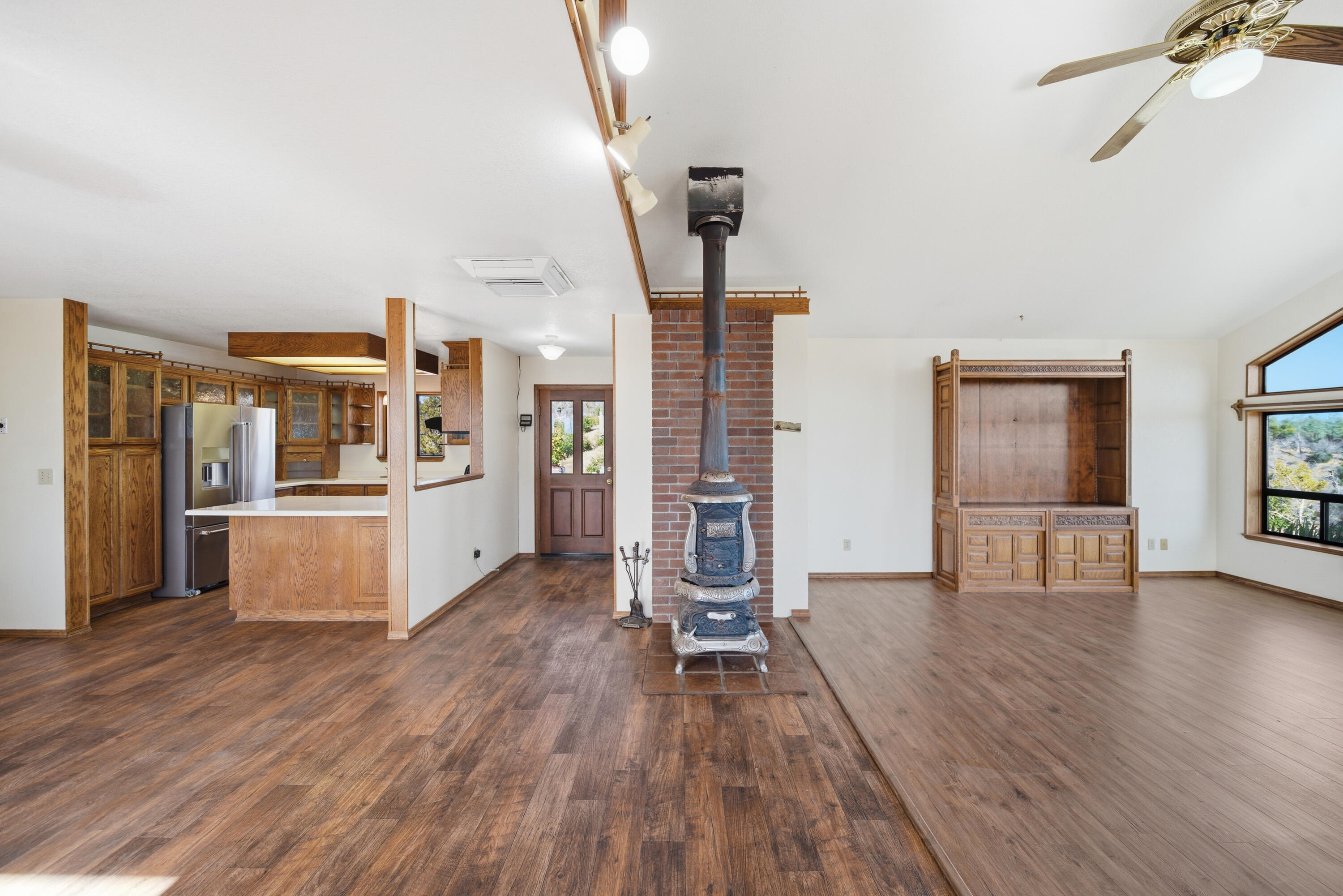 14018 Highview Trail Redding, CA 96003 - Photo 15 of 41 a living room with furniture and wooden floor