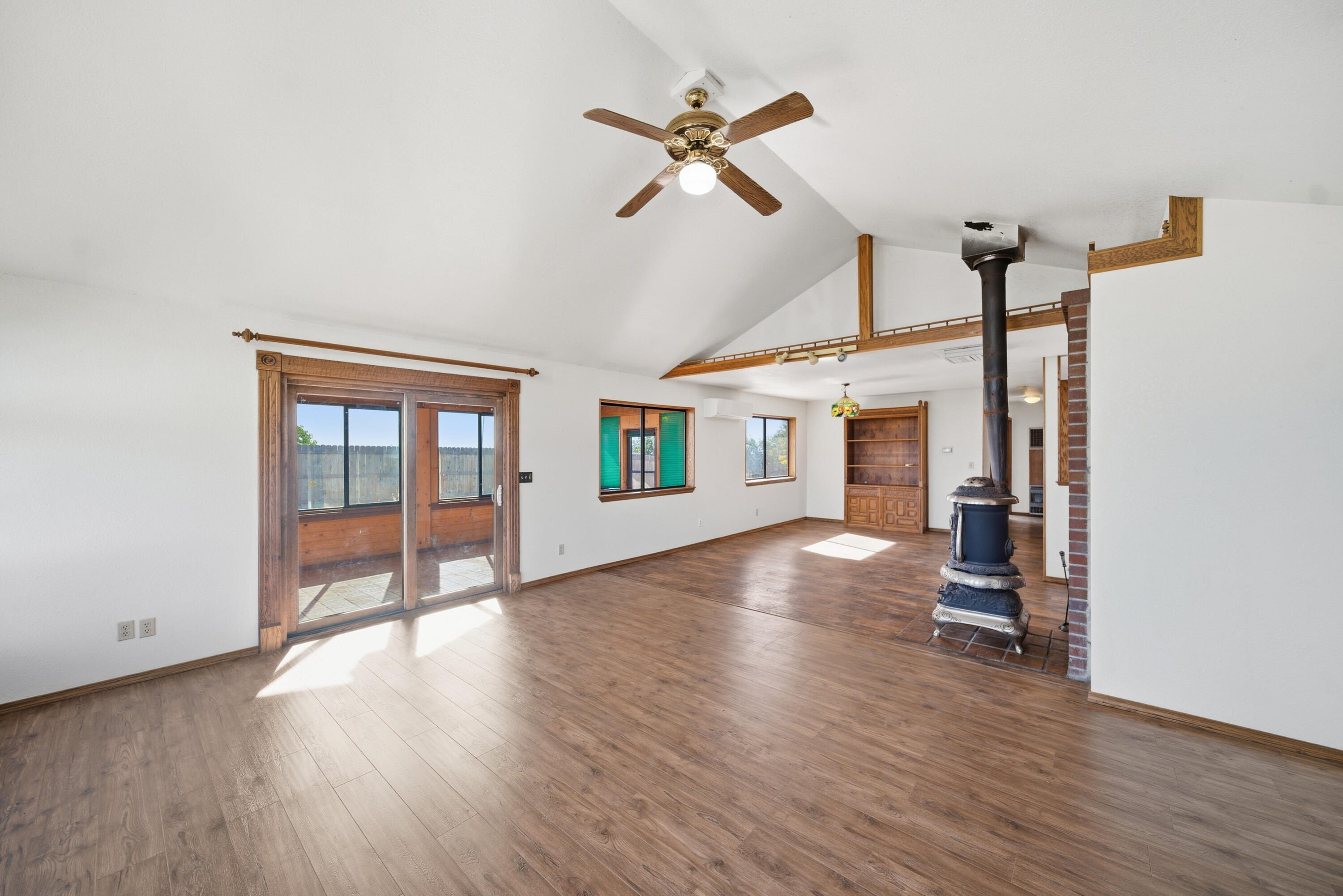 14018 Highview Trail Redding, CA 96003 - Photo 16 of 41 wooden floor in an empty room with a window