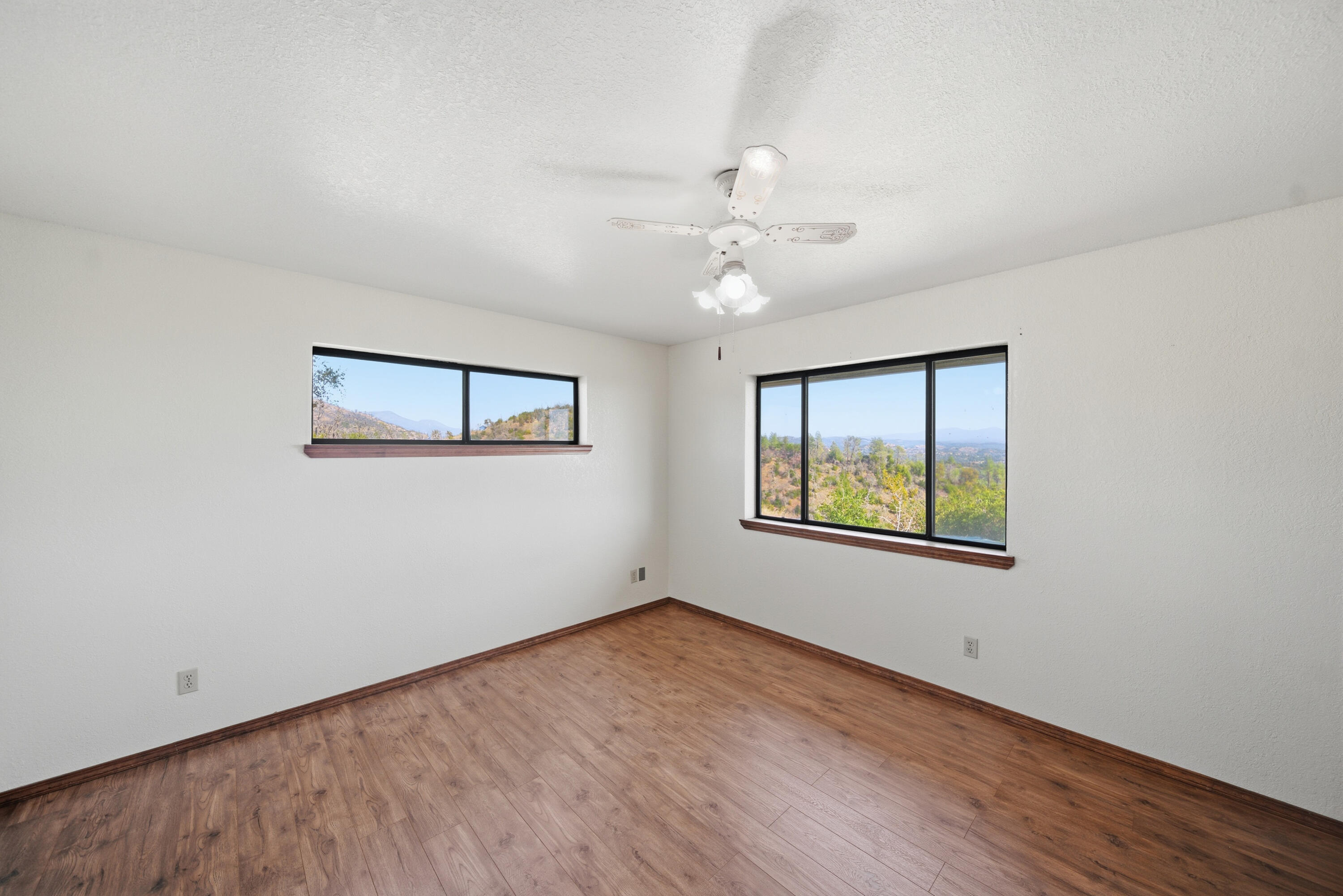 14018 Highview Trail Redding, CA 96003 - Photo 20 of 41 a view of an empty room with a window