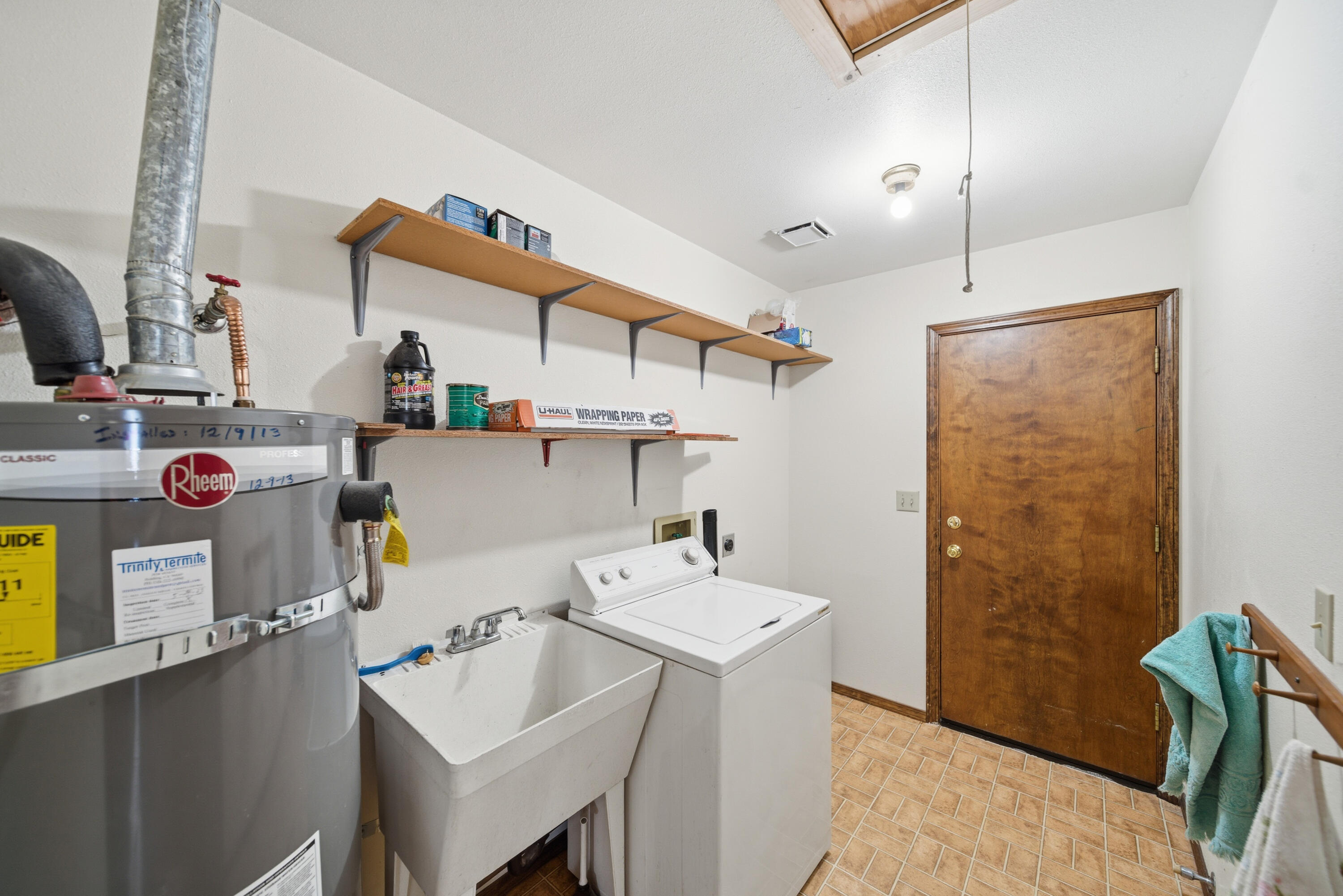 14018 Highview Trail Redding, CA 96003 - Photo 25 of 41 a utility room with sink dryer and washer